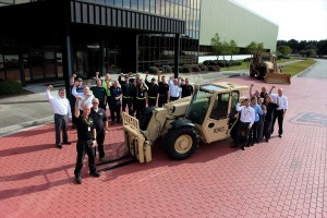 Employees at JCB's North American HQ celebrate news of the $142 million U.S. Army order